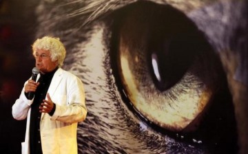 French movie director Jean-Jacques Annaud speaks at a conference.