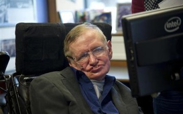 English physicist Stephen Hawking sits at his desk in the Applied Mathematics Department of Cambridge University, Aug. 30, 2012.