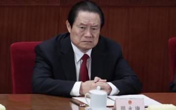 China's former Politburo Standing Committee Member Zhou Yongkang was arrested for corruption in Dec. 2014, so even if the proposal passes, it will not apply to him. 