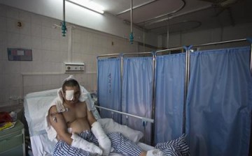 A patient waiting for an operation at a hospital in southern China.