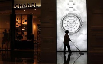 Chanel will cut prices on some of its popular handbag brands in China.