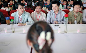 A table of potential Chinese husbands at a dating event in Shanghai.