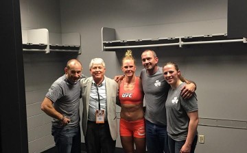 Holly Holm with her coaches 