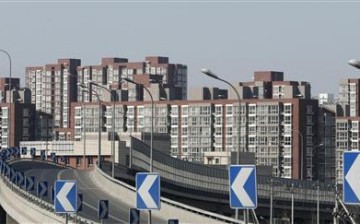 Apartments are seen from a street in Beijing. 