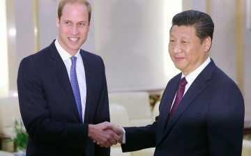 Prince William (L), Duke of Cambridge, meets President Xi Jinping at the Great Hall of the People in Beijing on March 2. 