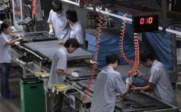 Production line workers in China's Guangdong Province