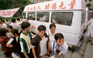 Volunteer blood donors at a mobile laboratory in Chengdu, China.
