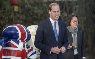 Prince William poses with a 
