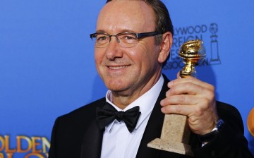 Kevin Spacey poses backstage with his award for Best Performance by an Actor in a Television Series for 