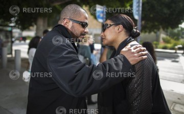 Nona Gaye (R) and Marvin Gaye III, daughter and son of late singer Marvin Gaye, leave court in Los Angeles, California March 10, 2015. Heirs of the late soul singer Marvin Gaye won a $7.4 million judgment on Tuesday against recording stars Robin Thicke an