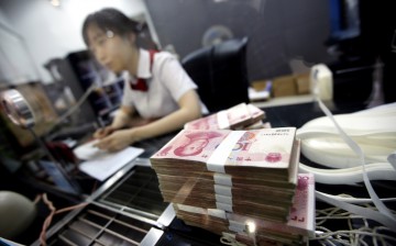 Financial experts say China's yuan is putting pressure on international currencies.