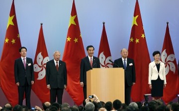 Zhang Xiaoming, director of the Liaison Office of the Central People's Government in Hong Kong, with other Hong Kong officials during the celebration of the 65th anniversary of China National Day.