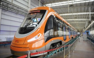 A newly manufactured tram powered by hydrogen fuel cells is presented at Qingdao. 