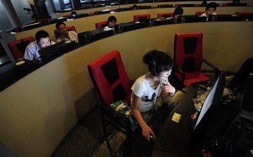 A group of young people use computers at an Internet cafe in Hefei, Anhui Province. 