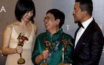 Bae Doo-na (left), Ann Hui (center) and Liao Fan (right) won the Best Actress, Best Director and Best Actor awards during the 9th Asian Film Awards.