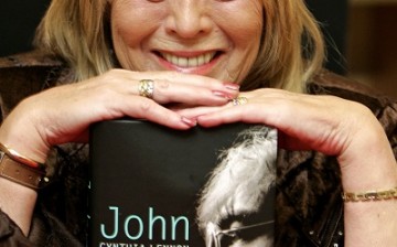 Cynthia Lennon, first wife of former Beatle John Lennon, poses with copies of her newly published biography entitled 