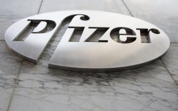 The Pfizer logo is seen at their headquarters in New York, April 28, 2014.