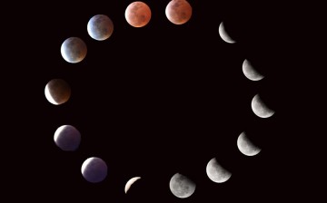 A total lunar eclipse is observed in Shenzhen, South China's Guangdong Province, April 4, 2015.