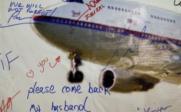 A message left on a board of remembrance by Kelly (last name not given), 29, the wife of a passenger aboard missing Malaysia Airlines Flight MH370, at a vigil ahead of the one-year anniversary of its disappearance in Kuala Lumpur, March 6, 2015. Malaysia 