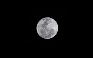 The full moon as seen over Lagos December 17, 2013. The last full moon of the year is the smallest too as the moon is at its most distant point from the earth's orbit, a phenomenon known as apogee