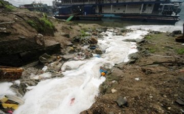 Sewage water from a seafood market flows into Jialing River, a branch of Yangtze River, in Chongqing Municipality.