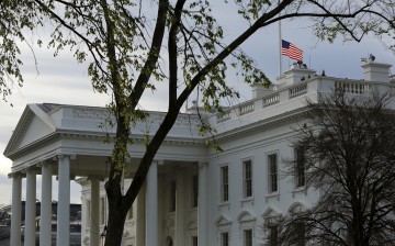 The U.S. flag flies at half-staff at the White House in Washington April 15, 2015.