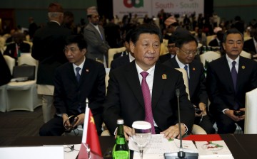 Chinese President Xi Jinping waits to deliver a speech at a plenary session during the Asian-African Conference in Jakarta, April 22, 2015.