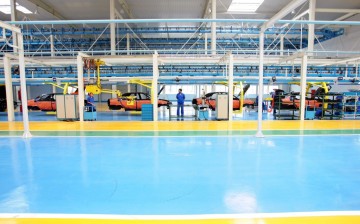 A man works at a Geely assembly facility in Shanghai. Geely’s recent acquisition of Volvo has made it the most viable car manufacturer from China to enter the U.S. market.
