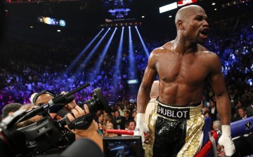 Floyd Mayweather, Jr. of the U.S.  yells out to the crowd after defeating Manny Pacquiao of the Philippines in their welterweight WBO, WBC and WBA (Super) title fight in Las Vegas, Nevada, May 2, 2015. 