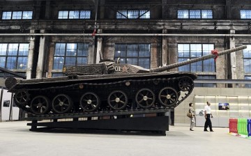 A full-scale replica of a ZTZ-99 tank, a main battle tank of Chinese People's Liberation Army (PLA) in an industrial exhibition in Shenyang, Liaoning Province.