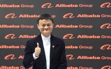 Alibaba chairman Jack Ma poses before the media during the CeBIT trade fair in Hanover.