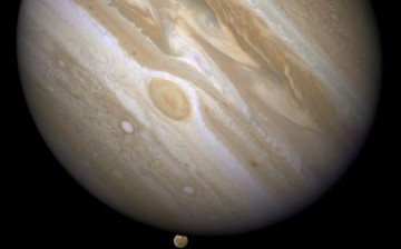 The planet Jupiter is shown with one of its moons, Ganymede (bottom) taken April 9, 2007.