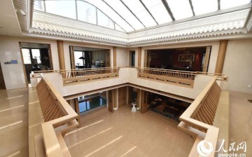 Beijing's most expensive house, which sells for 360,000 to 500,000 yuan per square meter in Xiaoyun Road, Chaoyang Central Business District, is being renovated into a courtyard house.