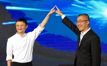 Alibaba's Executive Chairman Jack Ma and Shanghai Media Group (SMG) Chairman Li Ruigang at a news conference in Shanghai.