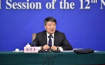 Xu Shaoshi, head of China's National Development and Reform Commission, answers questions at a press conference during the third session of China's 12th National People's Congress in March 2015.