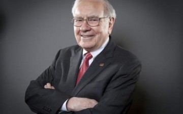 Warren Buffet posing for the camera.