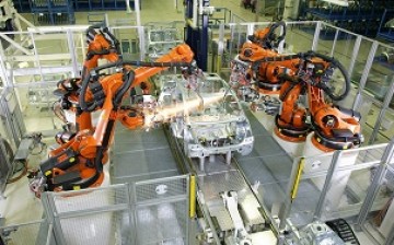 A photo of two robots used for auto manufacturing in China.