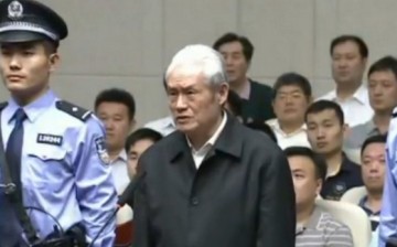 A screen grab taken from state TV footage shows former Chinese security chief Zhou Yongkang on trial at the Intermediate People's Court in Tianjin.