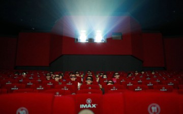 Patrons watch a 3D movie at an IMAX theater in Beijing in 2012.