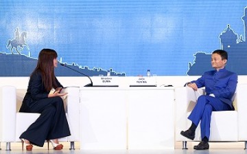 Global style icon Miroslava Duma interviews the executive chairman of the Alibaba Group, Jack Ma Yun, at the St. Petersburg International Economic Forum.