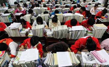 A group of Chinese students reviewing for the national college entrance exams or “gaokao.”