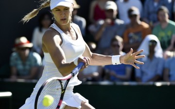 China's Duan Yingying beats Bouchard in a recent Wimbledon match.