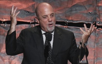 Singer Billy Joel speaks during the Songwriters Hall of Fame awards in New York in this file photo taken June 16, 2011. 