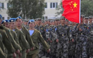 Chinese troops participate in a joint military exercise involving troops from China, Russia, Kazakhstan, Uzbekistan, Kyrgyzstan and Tajikistan.