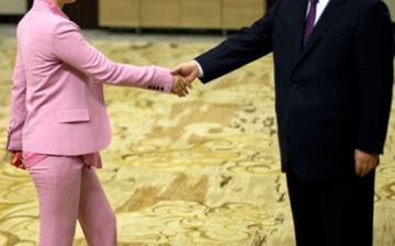 Chinese President Xi Jinping shakes hands with Li Xiaolin, chairman of China Power International Development Ltd., daughter of former premier Li Peng, during the Boao Forum in 2013.