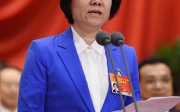 Shen Yueyue speaks during the third session of the 12th National People's Congress held at the Great Hall of the People on March 8, 2015.