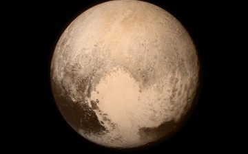 Pluto nearly fills the frame in this image from the Long Range Reconnaissance Imager (LORRI) aboard NASA’s New Horizons spacecraft, taken on July 13, 2015 when the spacecraft was 476,000 miles (768,000 kilometers) from the surface