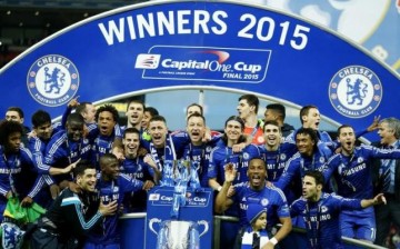 Chelsea players celebrate after winning the Capital One Cup.