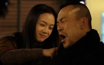 Tang Wei and Liao Fan in a scene from the movie 