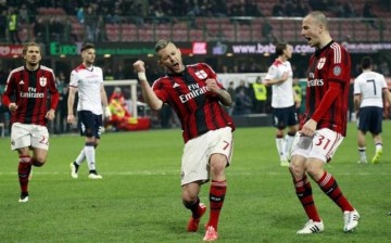 AC Milan's Jeremy Menez (C) celebrates after scoring against Cagliari during their Italian Serie A soccer match at Milan's San Siro stadium on March 21, 2015.